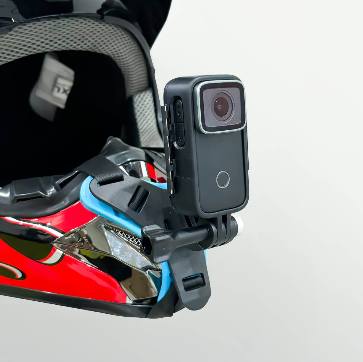 Helmet Chin Strap Mount attached to a helmet, featuring a mounted camera for capturing action shots.