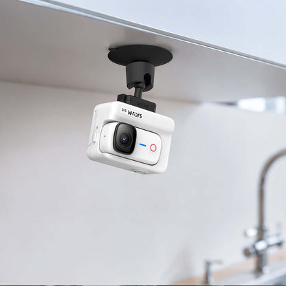 Adjustable Suction Cup Mount for S10 holding a camera under a shelf in a modern kitchen.