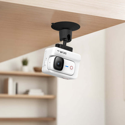 Adjustable Suction Cup Mount holding a camera under a shelf in a modern home setting.